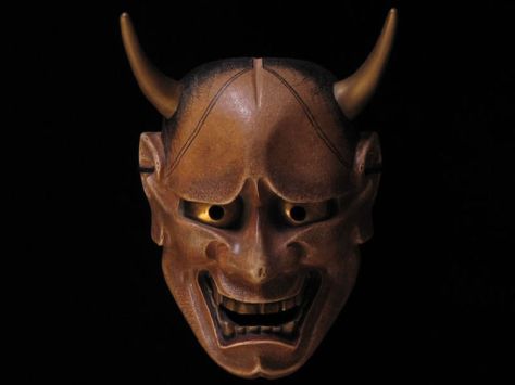The Hannya (般若) mask is a mask used in Noh theater, representing a jealous female demon. It possesses two sharp bull-like horns, metallic eyes, and a leering mouth.